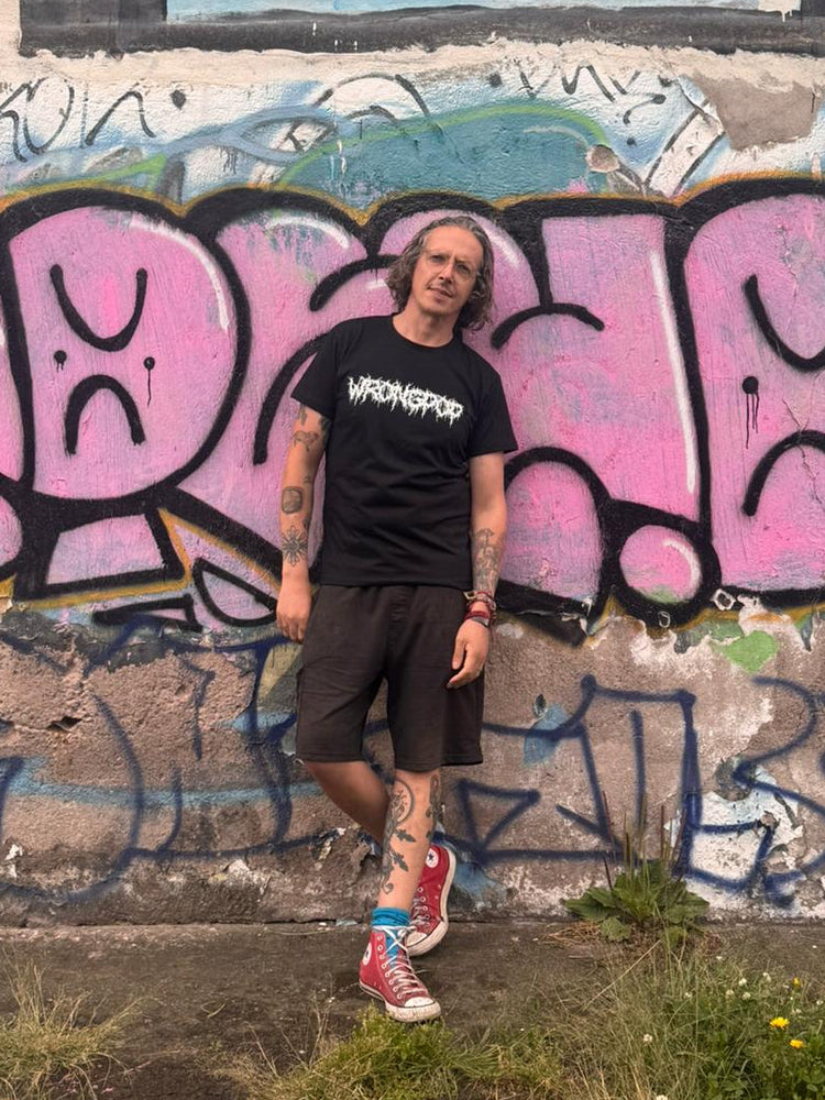 Wrongpop white logo tee — worn front view